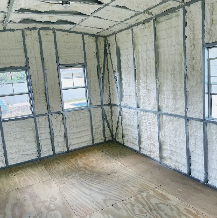 Closed-cell spray foam insulation applied to wall cavities in a residential project in Iron Mountain