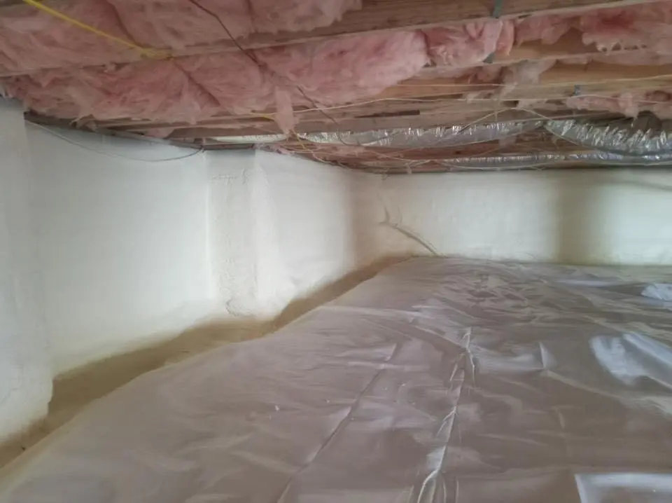 Crawl space encapsulation with closed-cell spray foam for Storm Damage Roof Repair in Iron Mountain